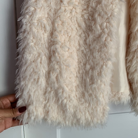 We have a Very Pretty comfortable XS/S Tan Vest. - Picture 2 of 4